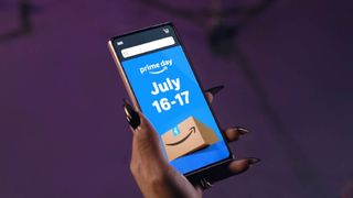Megan Thee Stallion holding phone showing Amazon Prime Day 2024 dates of July 16-17