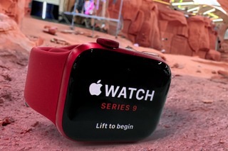 Red Apple Watch Series 9 in a desert in an AI generated image.